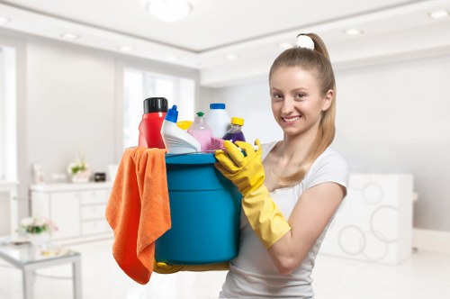 Professional cleaners maintaining a W5 office workspace